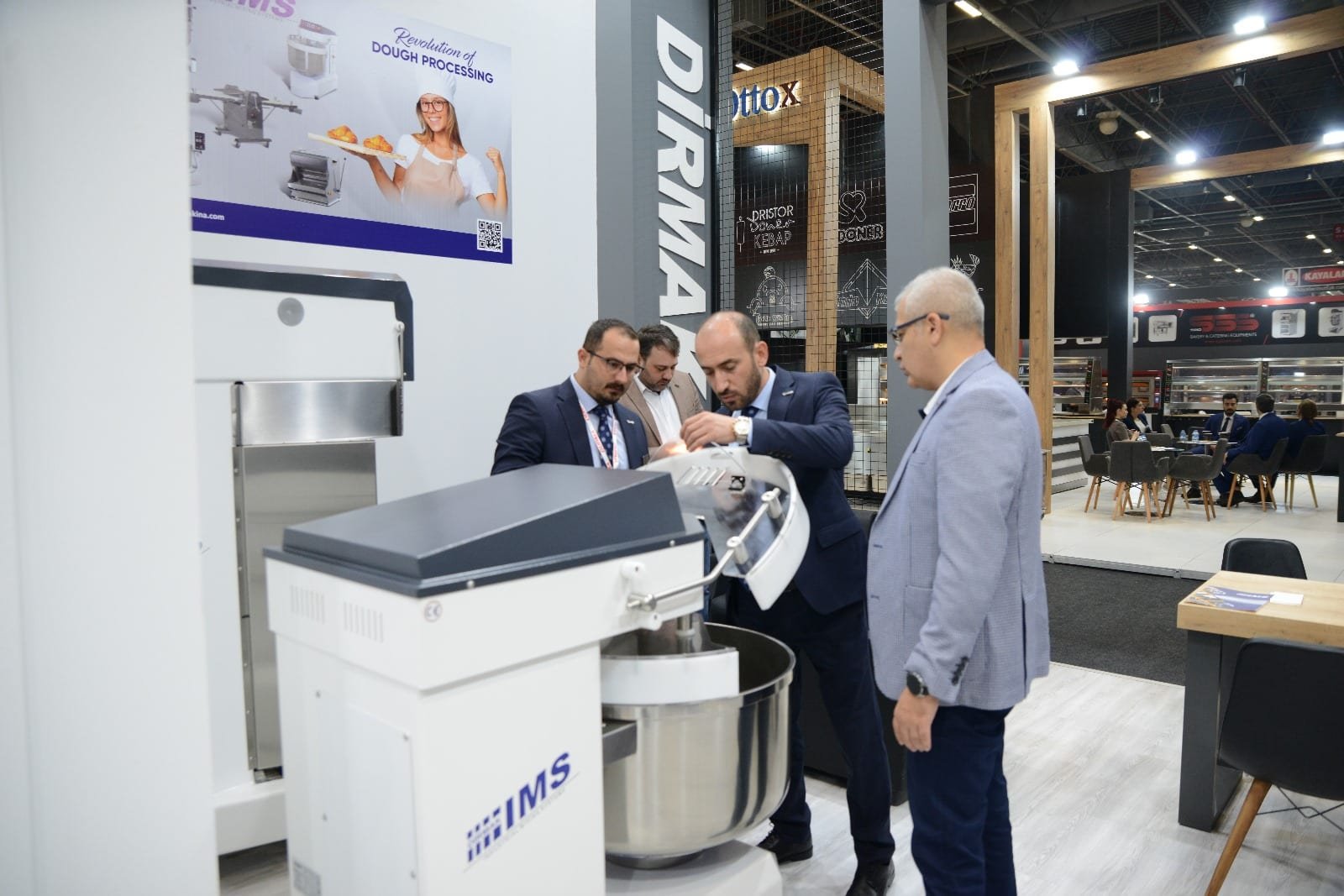 Dirmak IBT planetary mixers on stand at an international food-equipment trade fair.